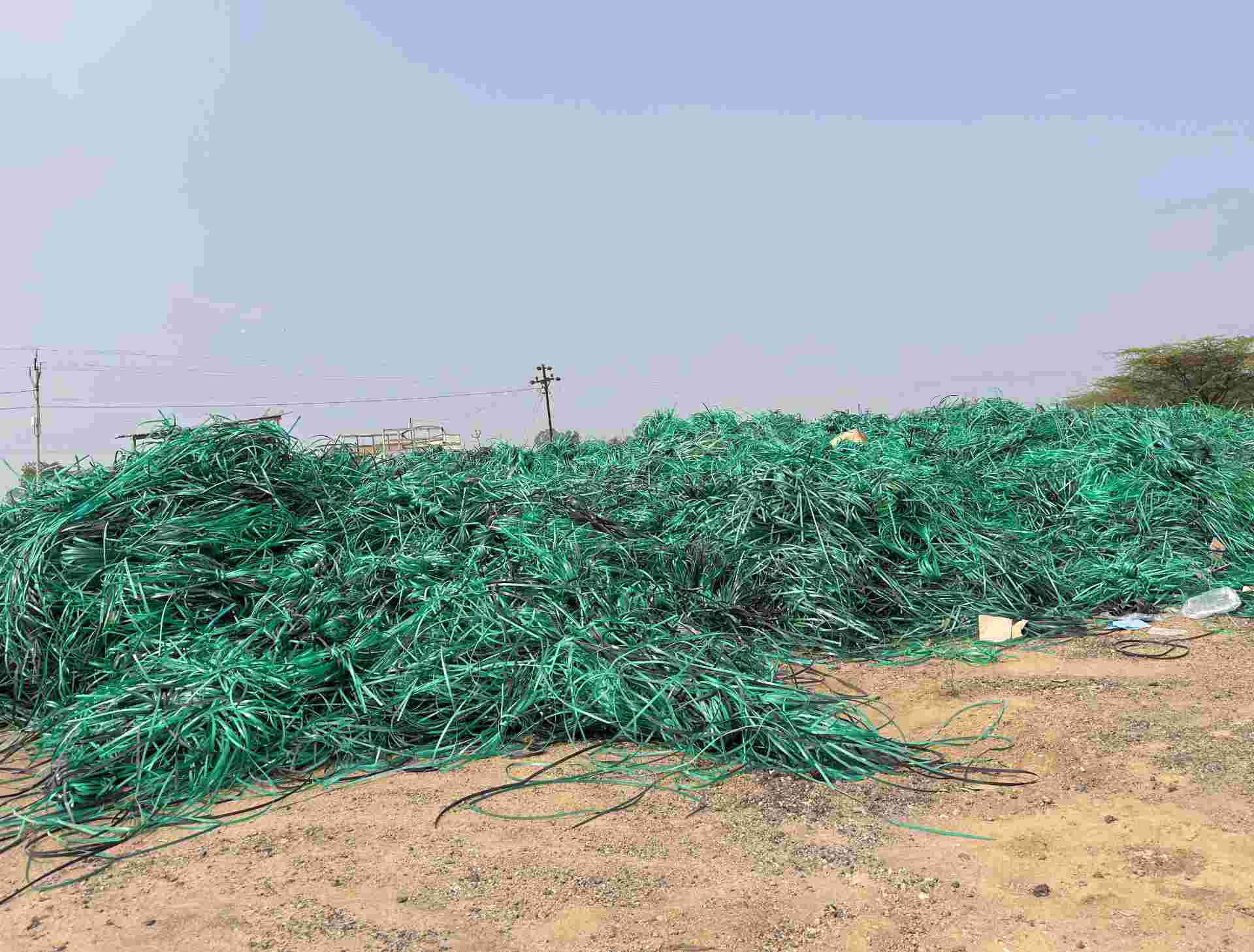 GREEN STRAP PATTI SCRAP PET Rolls Scrap Baled Film Grade Mix Scrap indore madhya pradesh india Plastic4trade